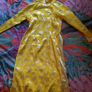 Vietnamese yellow and silver ao dai